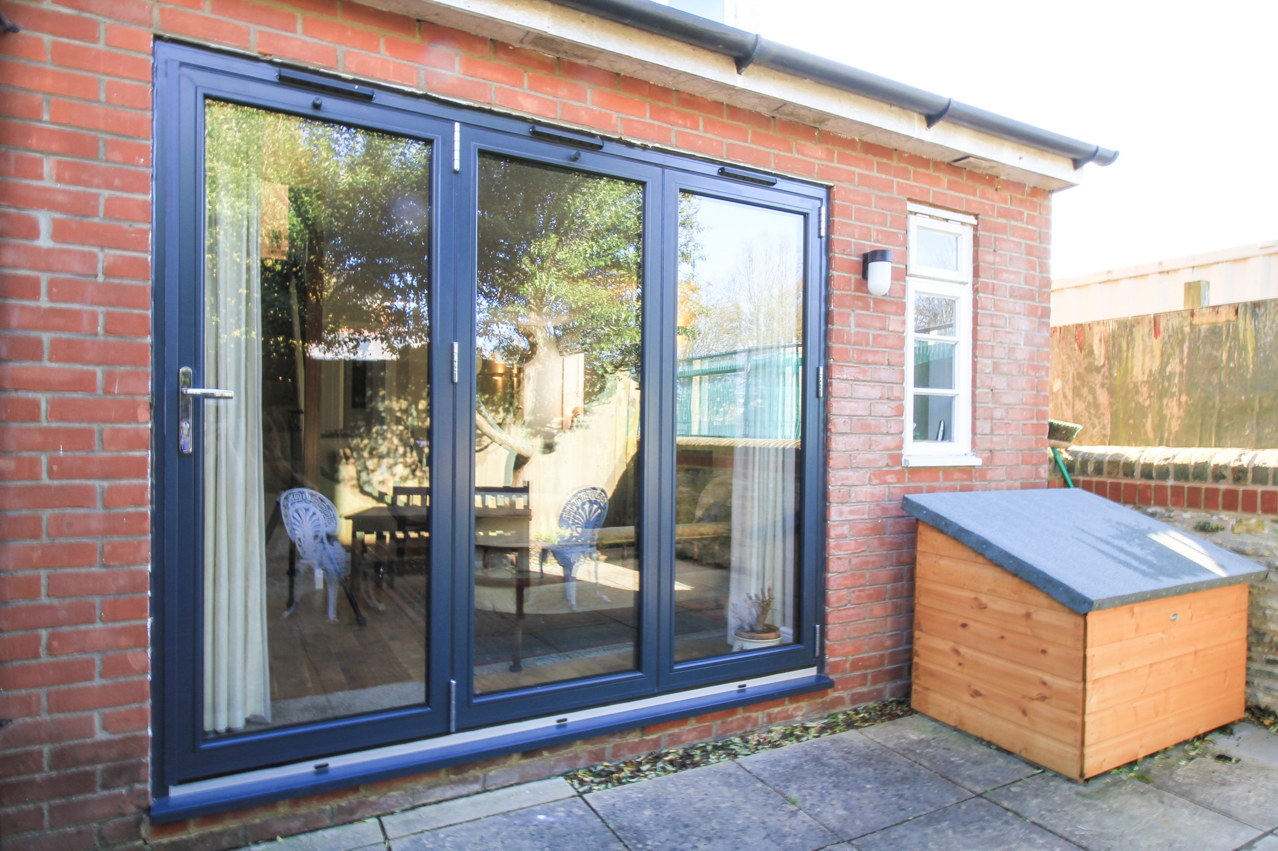 a glass doors on a brick building